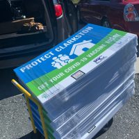 stack of yard signs
